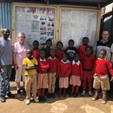 Sponsored students at Red Rose School together with Headmaster