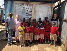 Sponsored students at Red Rose School together with Headmaster