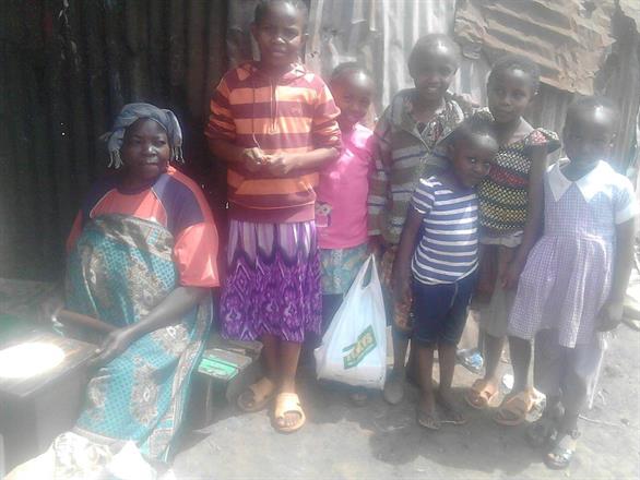 Grandma, Faith and her younger brother and sister + 3 sisters Chenja