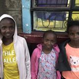 Three sisters waiting at Kibera Citadel