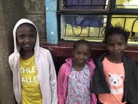 Three sisters waiting at Kibera Citadel