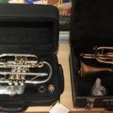 Two good cornets; 1 Axxon & 1 Carol Brass