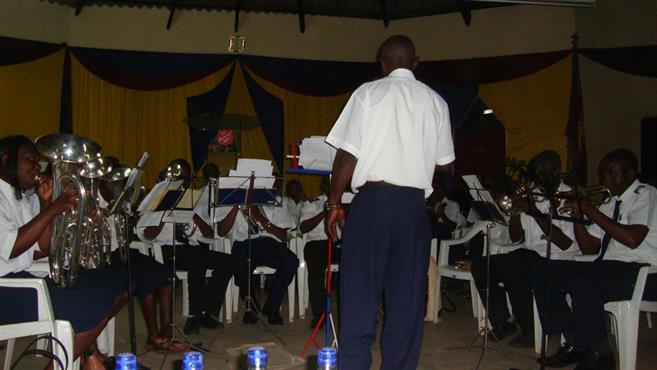 Kibera Band performing with Bandmaster Robert Simiyu