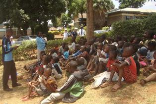 Bible Class outside Church Hall in Kibera