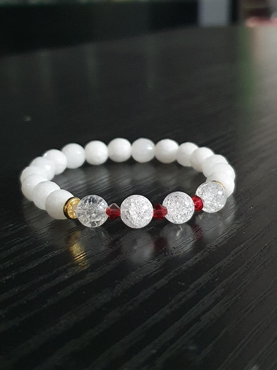 Smycken med röda swarovski kristaller/BERGKRISTALL