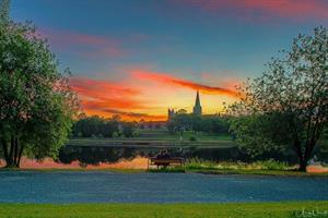 Aziz Nasuti-Romantic midnight sunset over Nidelva 