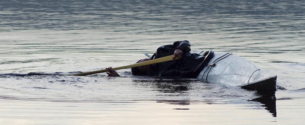 The head should be the last out of the water. Continue leaning backwards until you are stable