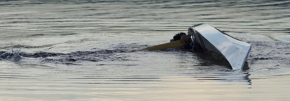 Grip the kayak with your knees and feet and twist your hips and press down on the blade